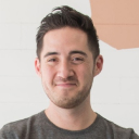 Michael against a light background